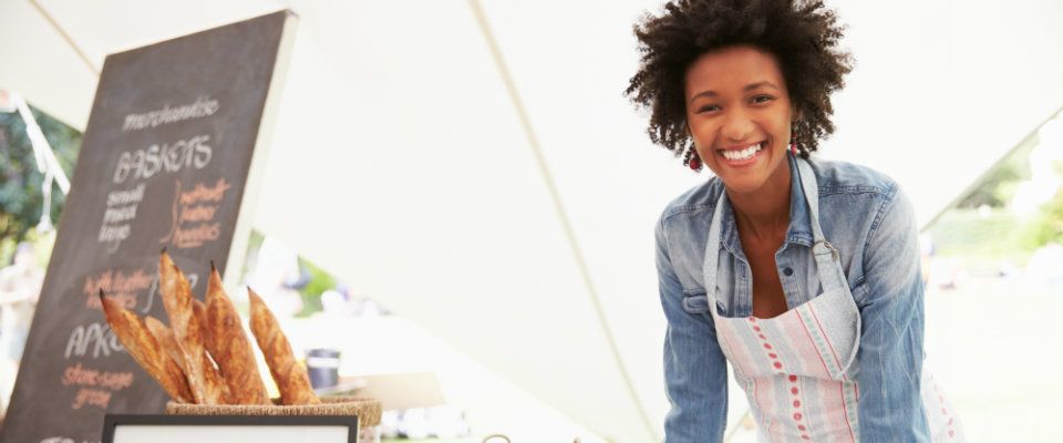 woman happy at bakery